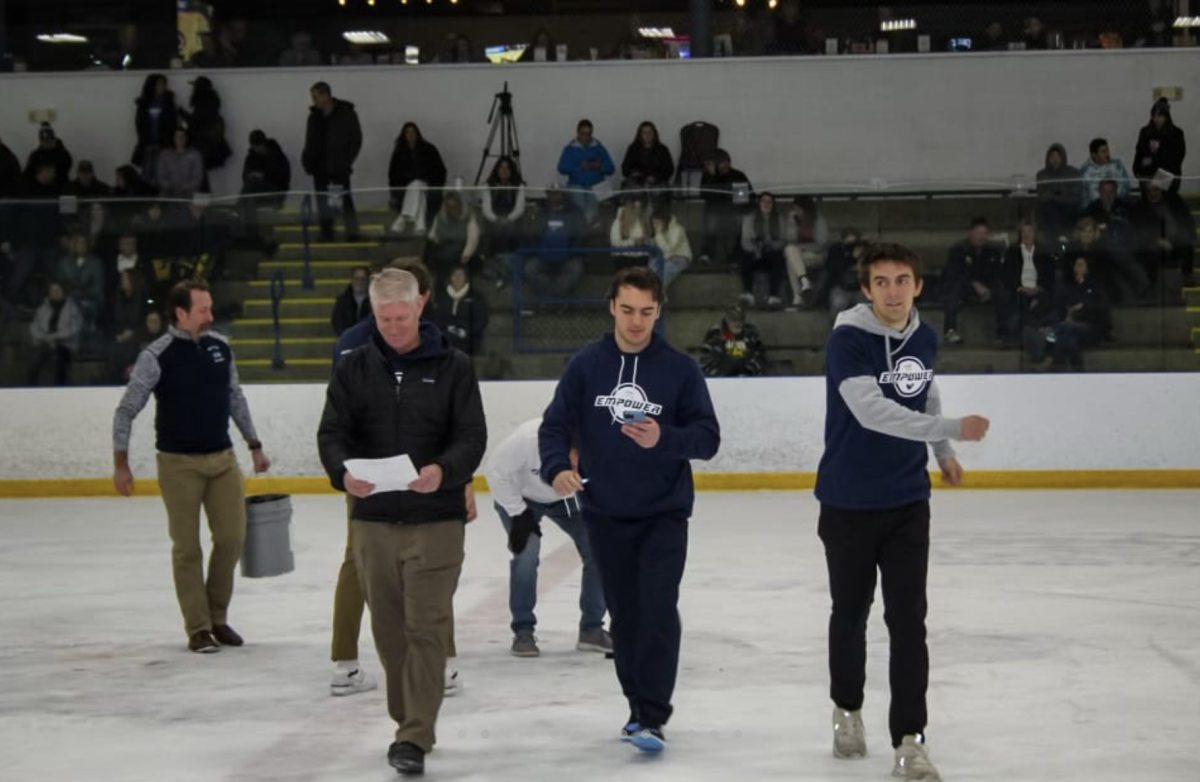 Clean up after chuck-a-puck fundraiser at Skyline Vs Pioneer 2024 MJR Night. 